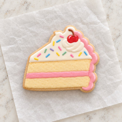 Cake Slice Outline Cookie Cutter (decorated cookie mockup)