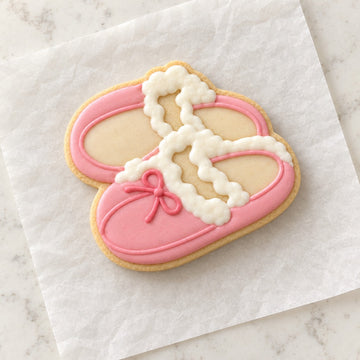 Fuzzy Slippers Cookie Cutter (decorated cookie mockup)