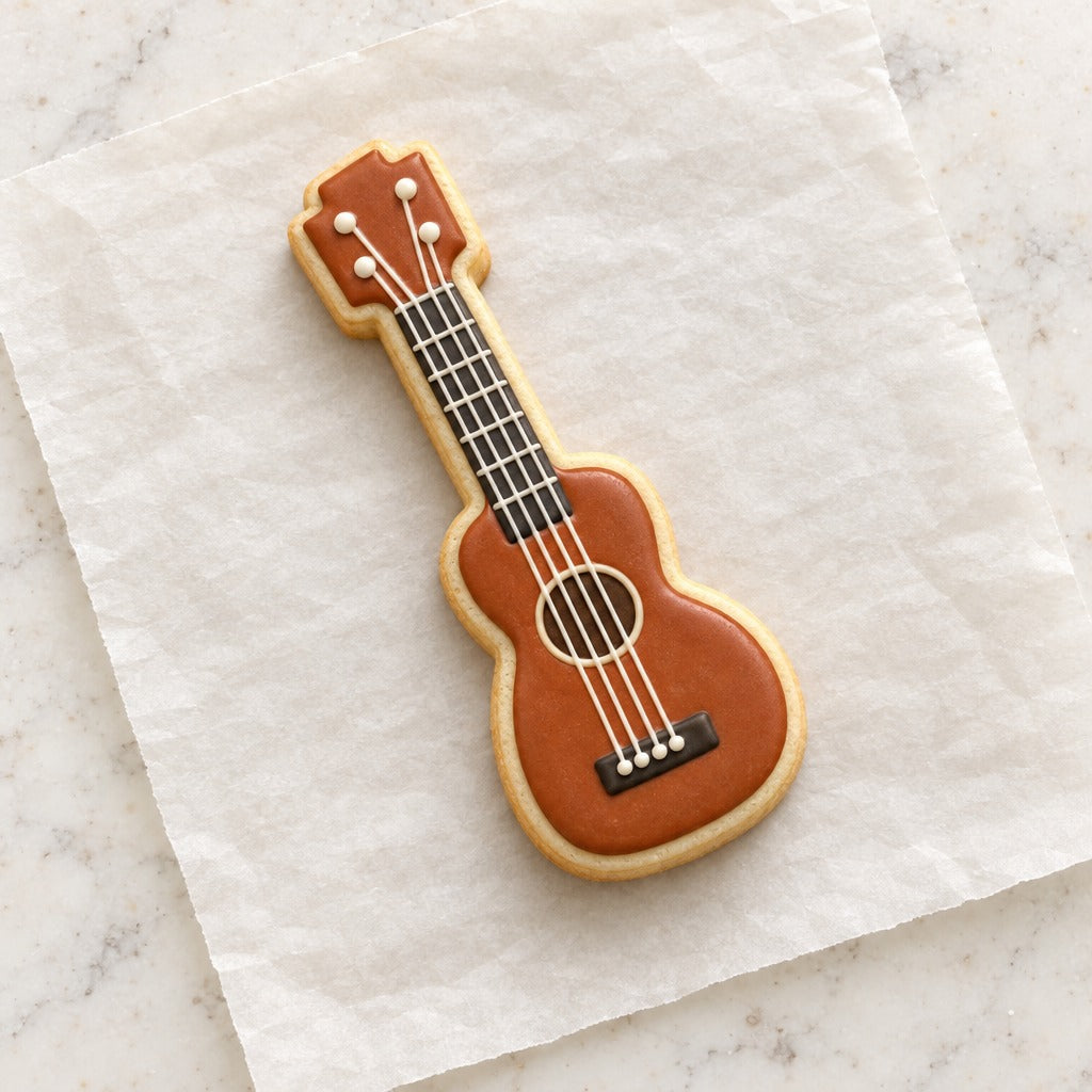 Guitar or Ukulele Cookie Cutter (decorated cookie mockup)