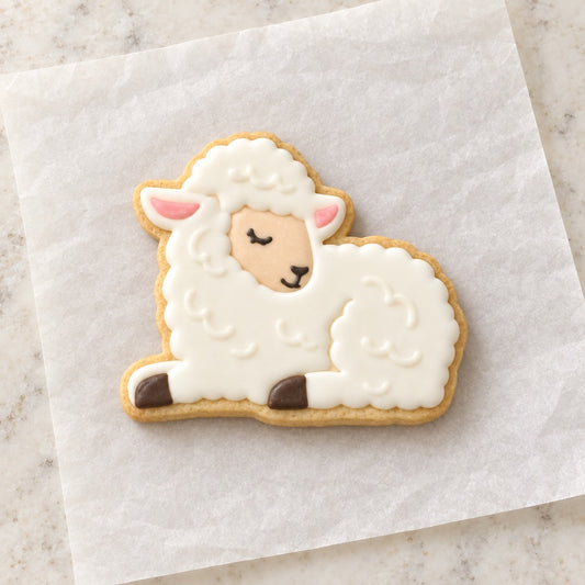 Lamb Sitting Cookie Cutter (decorated cookie mockup)