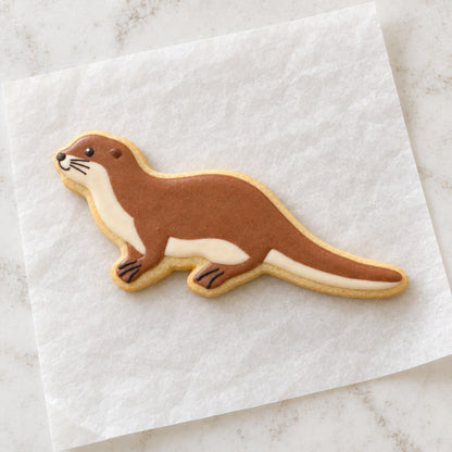 Otter Outline Cookie Cutter (decorated cookie mockup)