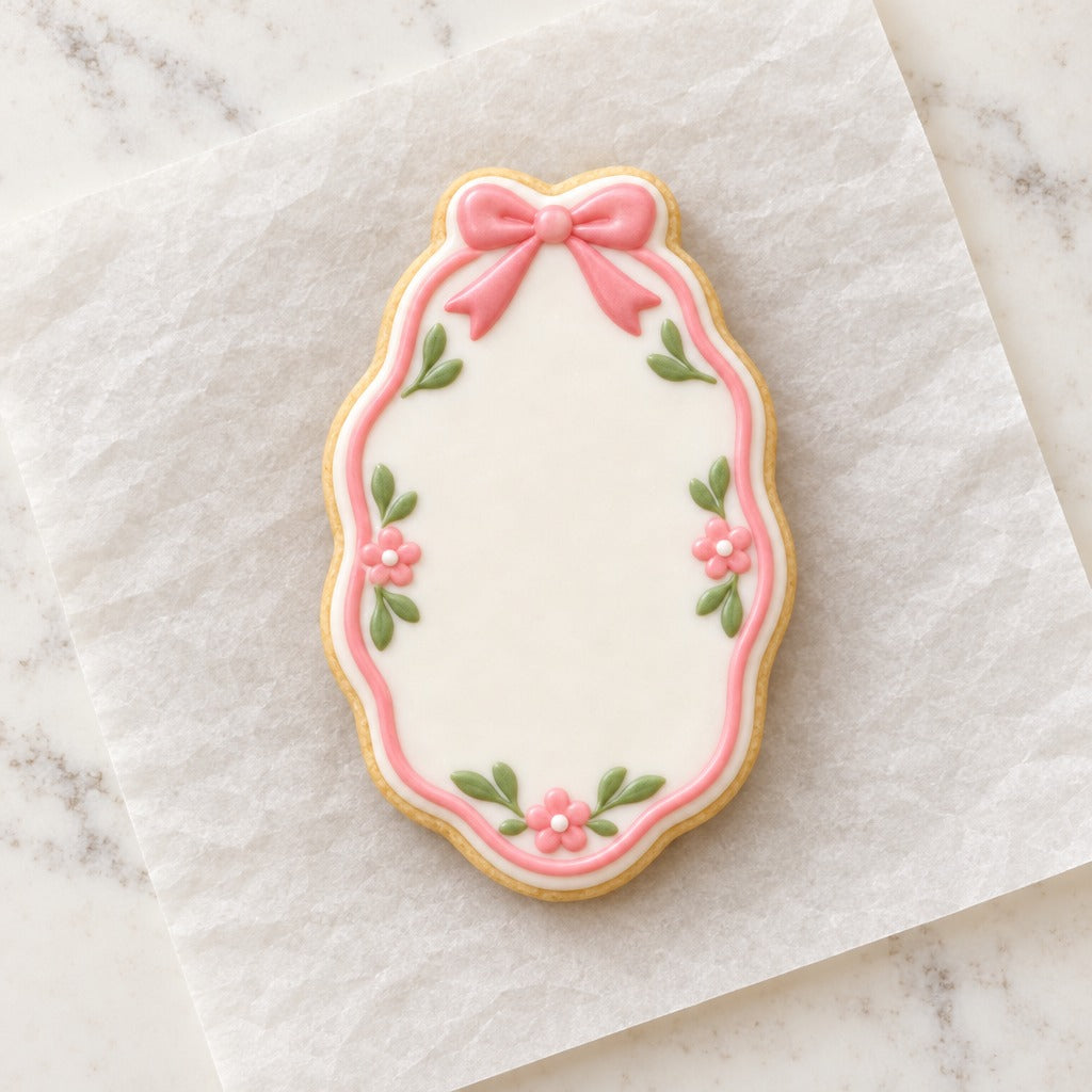Oval Bow Frame Cookie Cutter (decorated cookie mockup)