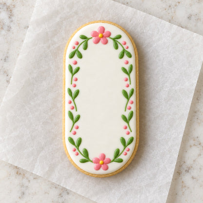 Oval with Straight Edges Cookie Cutter (decorated cookie mockup)
