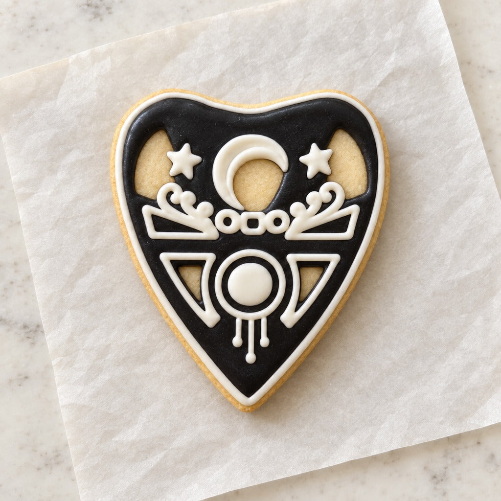 Spirit Board Planchette Cookie Cutter (decorated cookie mockup)