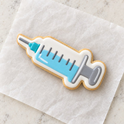 Vaccine Cookie Cutter (decorated cookie mockup)